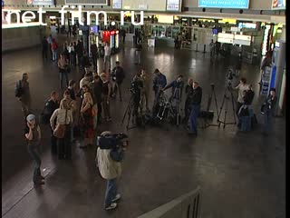 Footage Journalists and cameramen waiting for movie stars at Sheremetyevo Airport, 25th Moscow International Film Festival. (2003)
