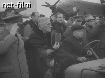 Footage Meeting at the airport of the US and UK delegations who arrived for the Yalta Conference. (1945)