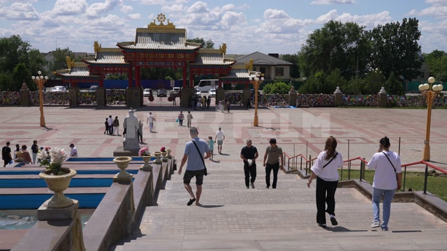 Kalmykia, Elista, city center, Golden Abode of Buddha Shakyamuni Buddhist Temple. People strolling