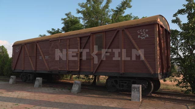 Kalmykia, summer, day, memorial complex, museum, in the frame is an old wooden freight car