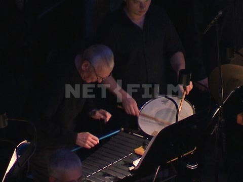 Theater, orchestra rehearsal. A musician plays the xylophone