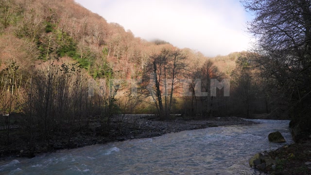 Абхазия, осень, день. Горы, горная река, течение