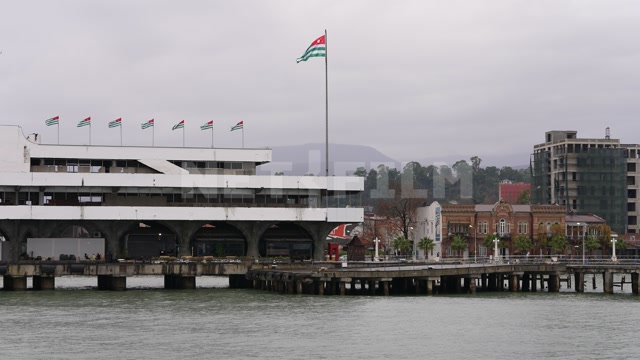 Абхазия, Сухуми, осень, пасмурный день. Сухумский морской порт. Причал. Черное море. Набережная