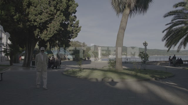 Abkhazia, Sukhumi, summer, daytime. Embankment, promenade, passersby, local residents in the frame