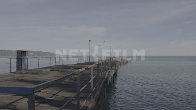 Abkhazia, Sukhumi, summer, day. Pier, embankment, dock. Sea