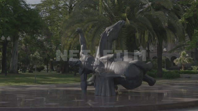 Abkhazia, Sukhum, nature, summer, day. Park, square, in the frame is a monument to the Muhajirs