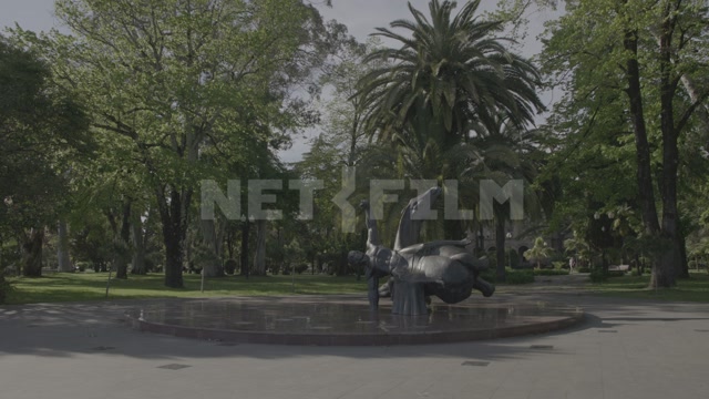 Abkhazia, Sukhum, nature, summer, day. Park, square, in the frame is a monument to the Muhajirs