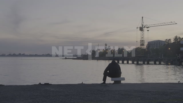 Abkhazia, Sukhumi, evening, embankment, pier, construction crane