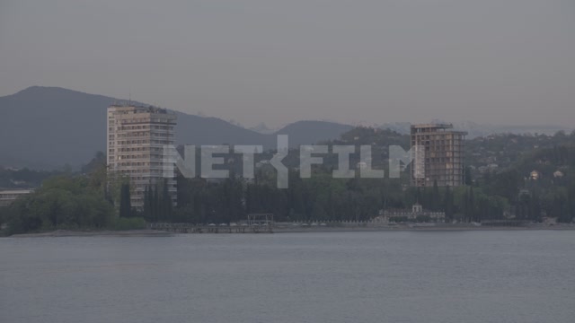 Abkhazia, Sukhumi, Black Sea, embankment, panorama of the coast, mountains, city, buildings in the
