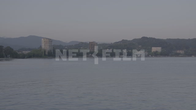 Abkhazia, Sukhumi, evening. Black Sea, embankment, view of the city