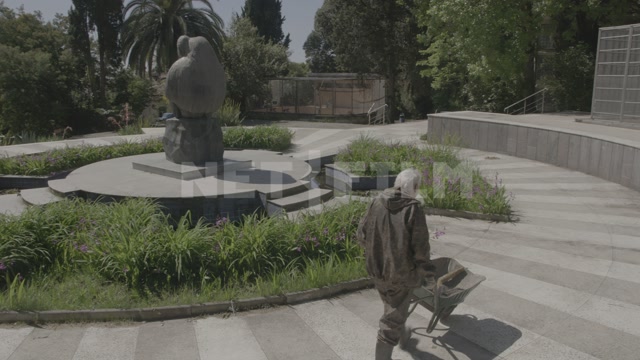 Abkhazia, Sukhum, monkey nursery grounds, monkey sculpture, cages, enclosures, nursery employee