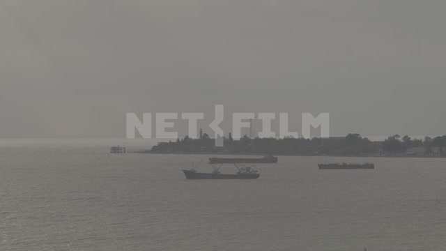 Abkhazia, Sukhumi, evening, seashore, view of the harbor, sea vessels